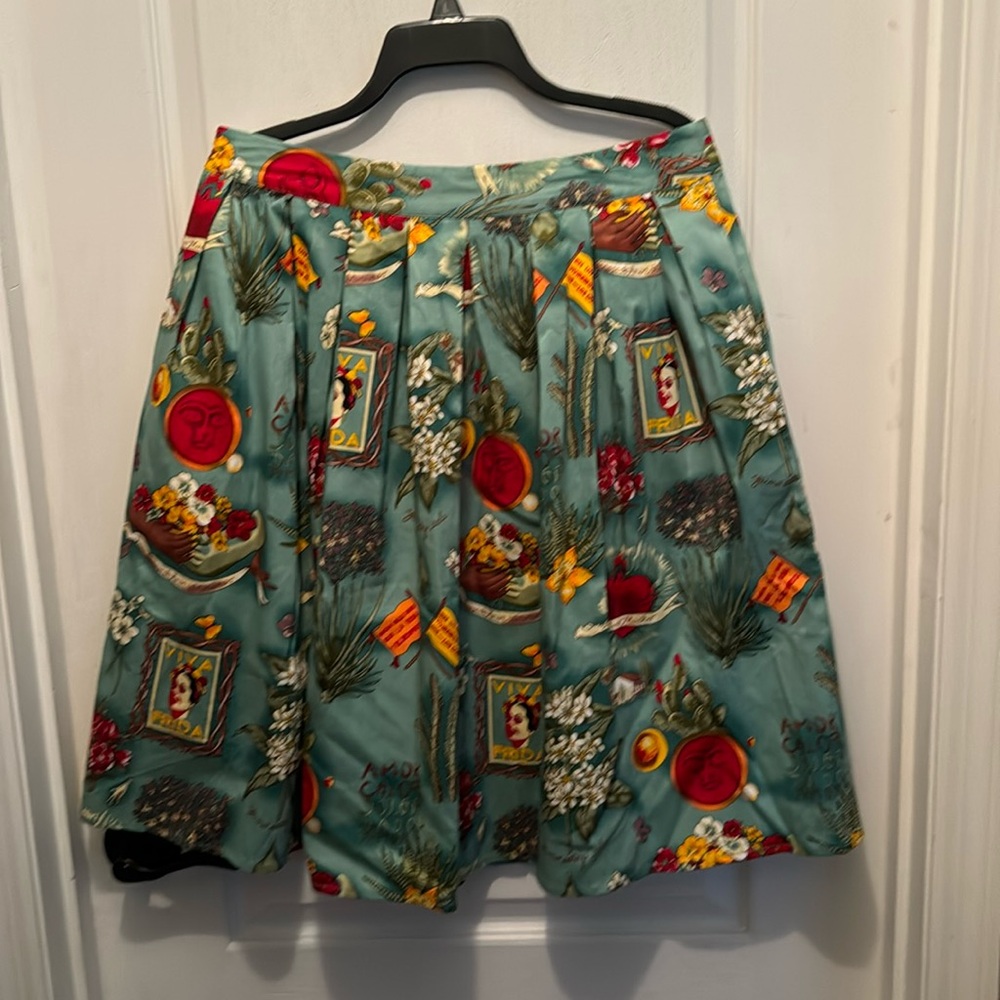 Grace Karin Frida circle skirt. It’s NWT in an XL that fits more like a Large